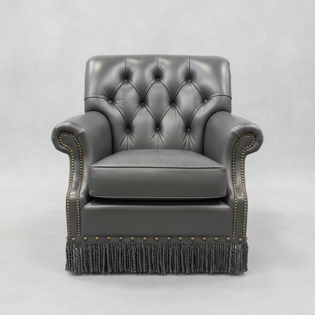 steel blue leather chair with tufted design on a wooden floor