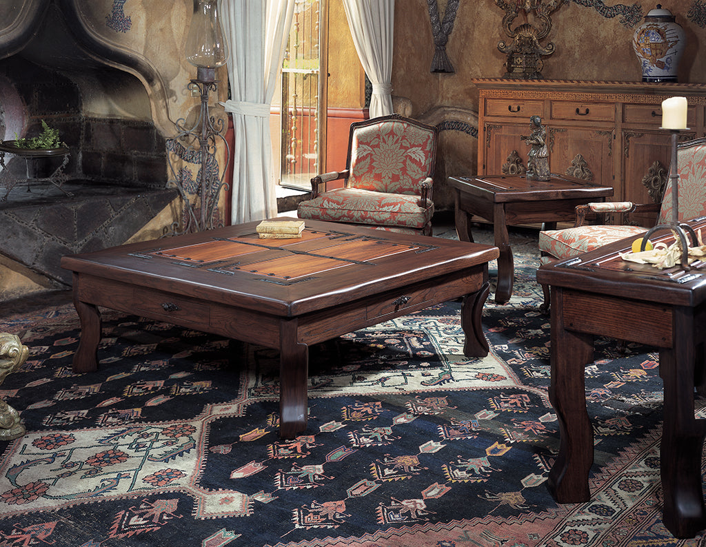 Vintage-style room with wooden furniture, patterned rug, and decorative elements.
