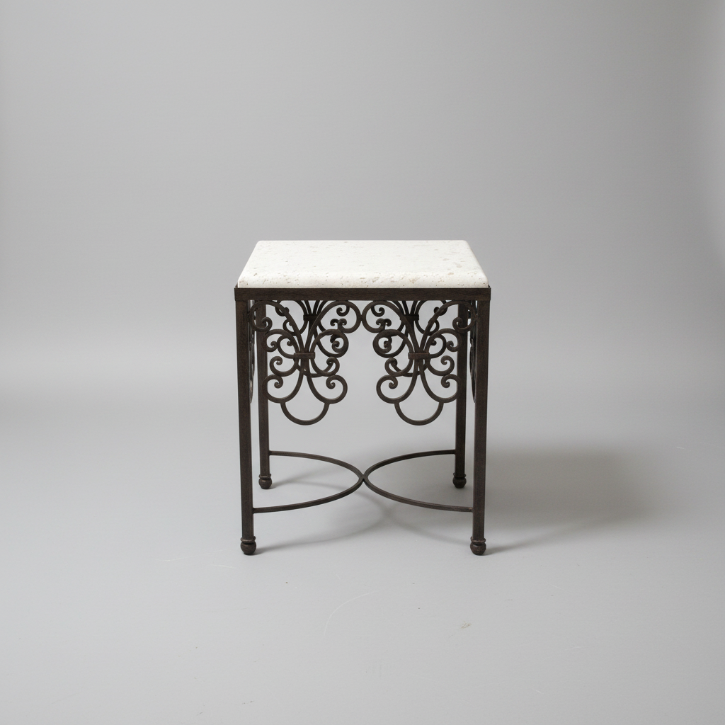 Decorative side table with cantera stone top and intricate metal frame on a gray background