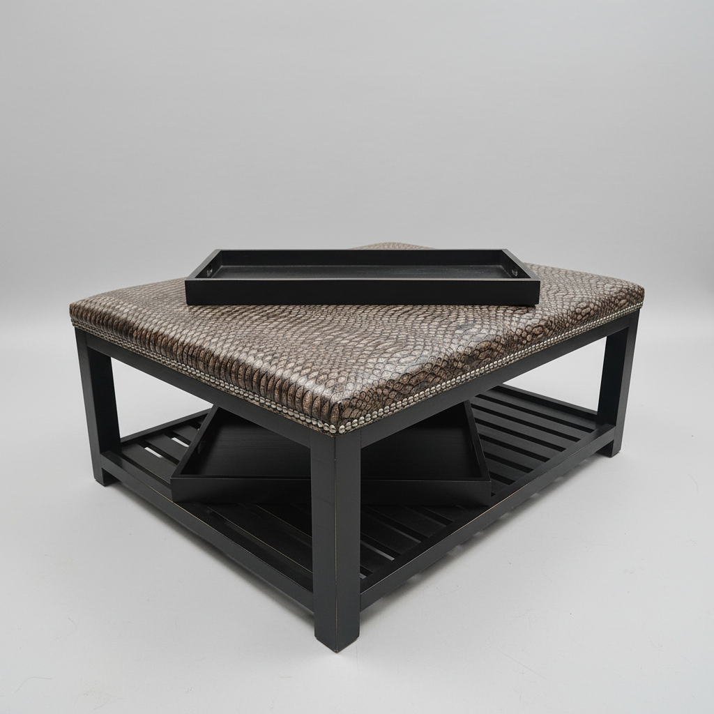 Square coffee table with patterned top and black tray on a gray background