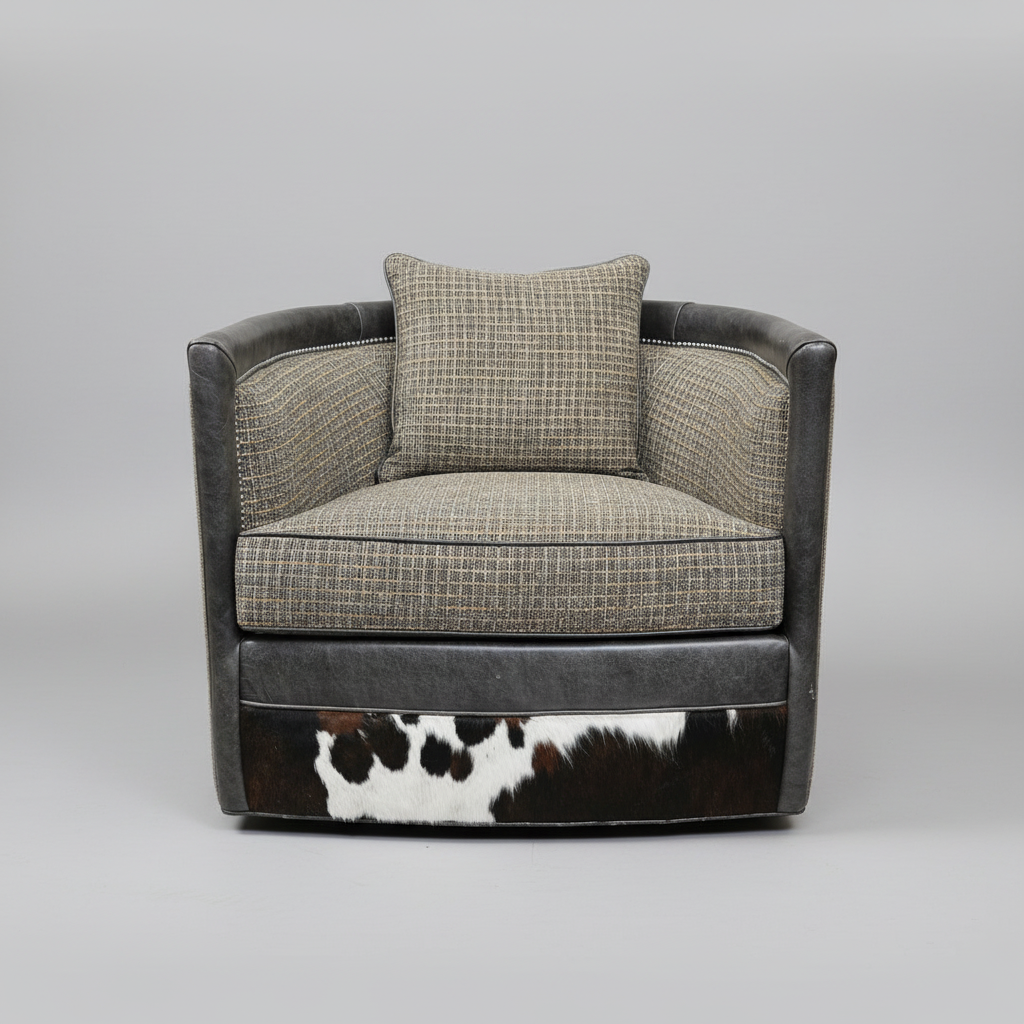 Chair with plaid patterned seat and backrest, black and white cowhide on the base, on a gray background