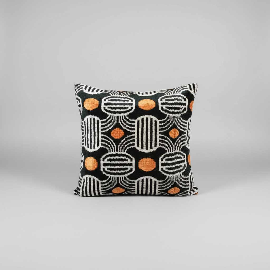 Decorative pillow with geometric pattern on a gray background