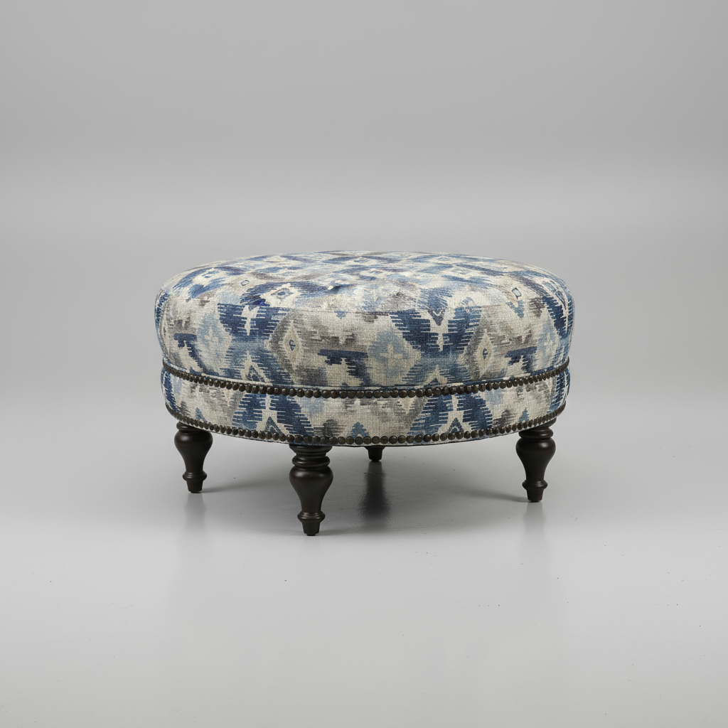 Decorative ottoman with blue and beige pattern on a gray background