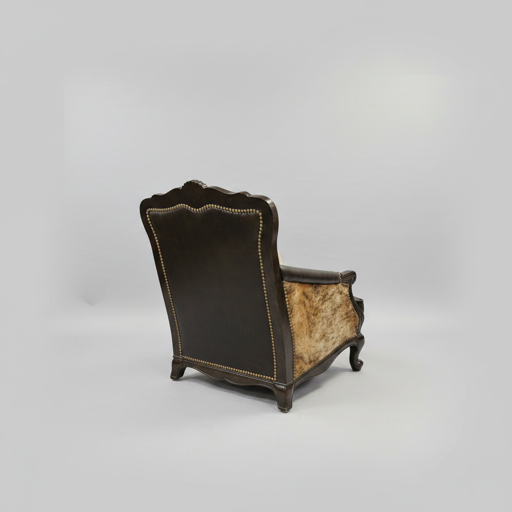 Vintage-style armchair with dark leather and patterned fabric on a gray background