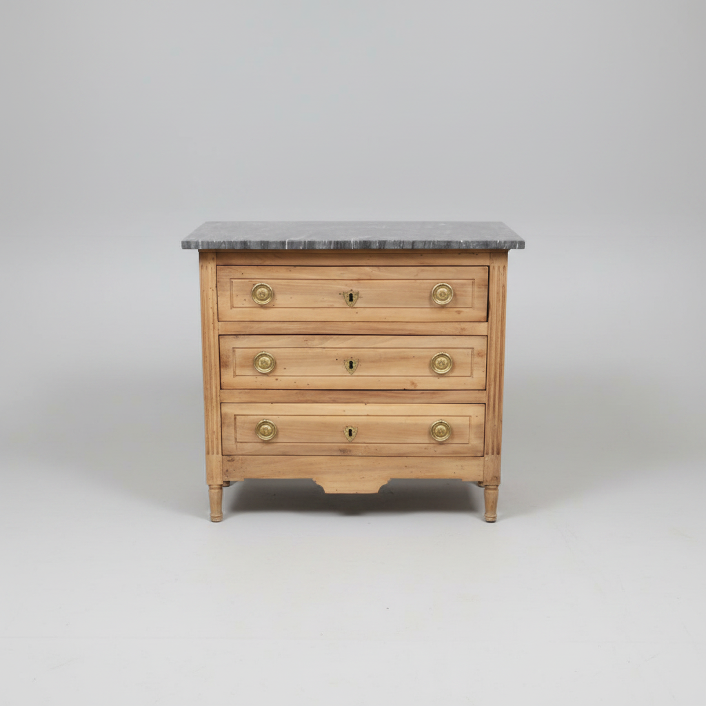 Wooden dresser with marble top on a gray background