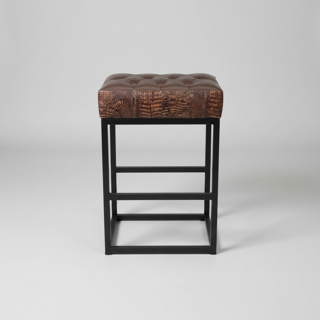 Bar stool with brown leather seat and black metal frame on a gray background