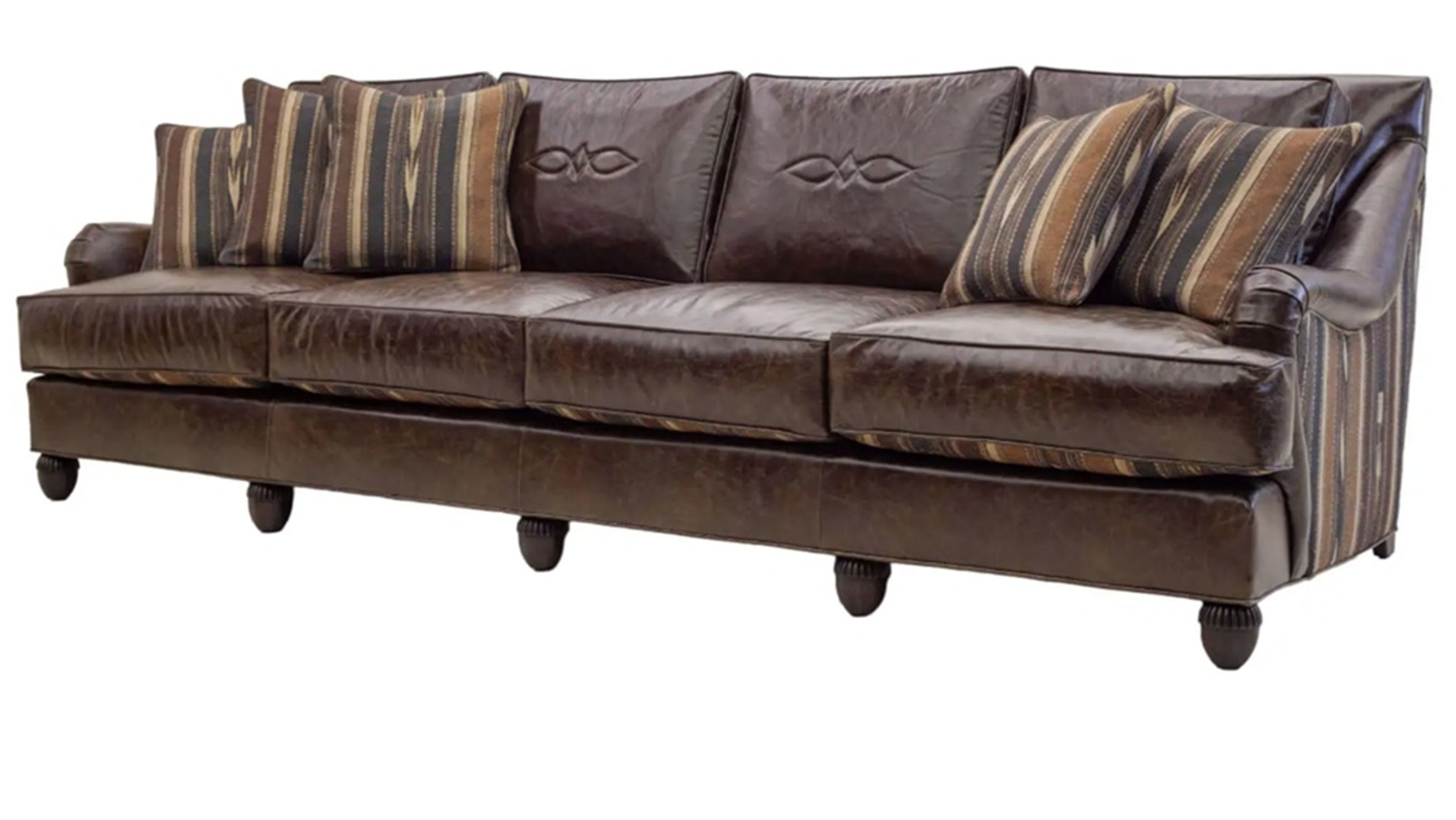 Brown leather sofa with striped cushions on a white background