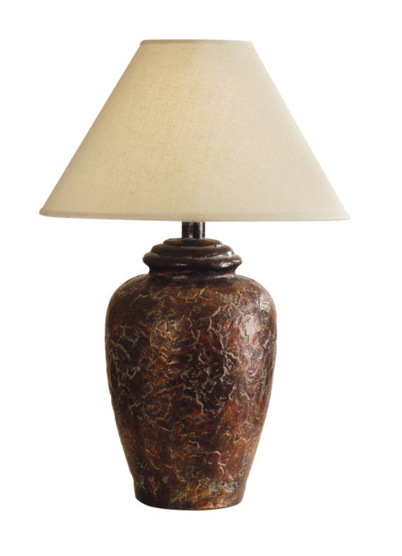Table lamp with a textured brown base and beige shade on a white background