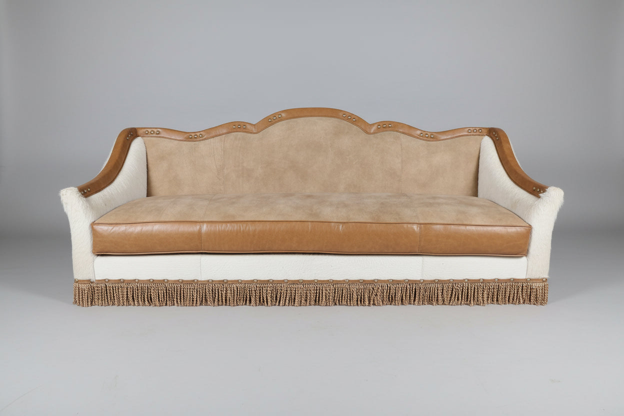 Decorative sofa with brown leather seat and white backrest on a gray background