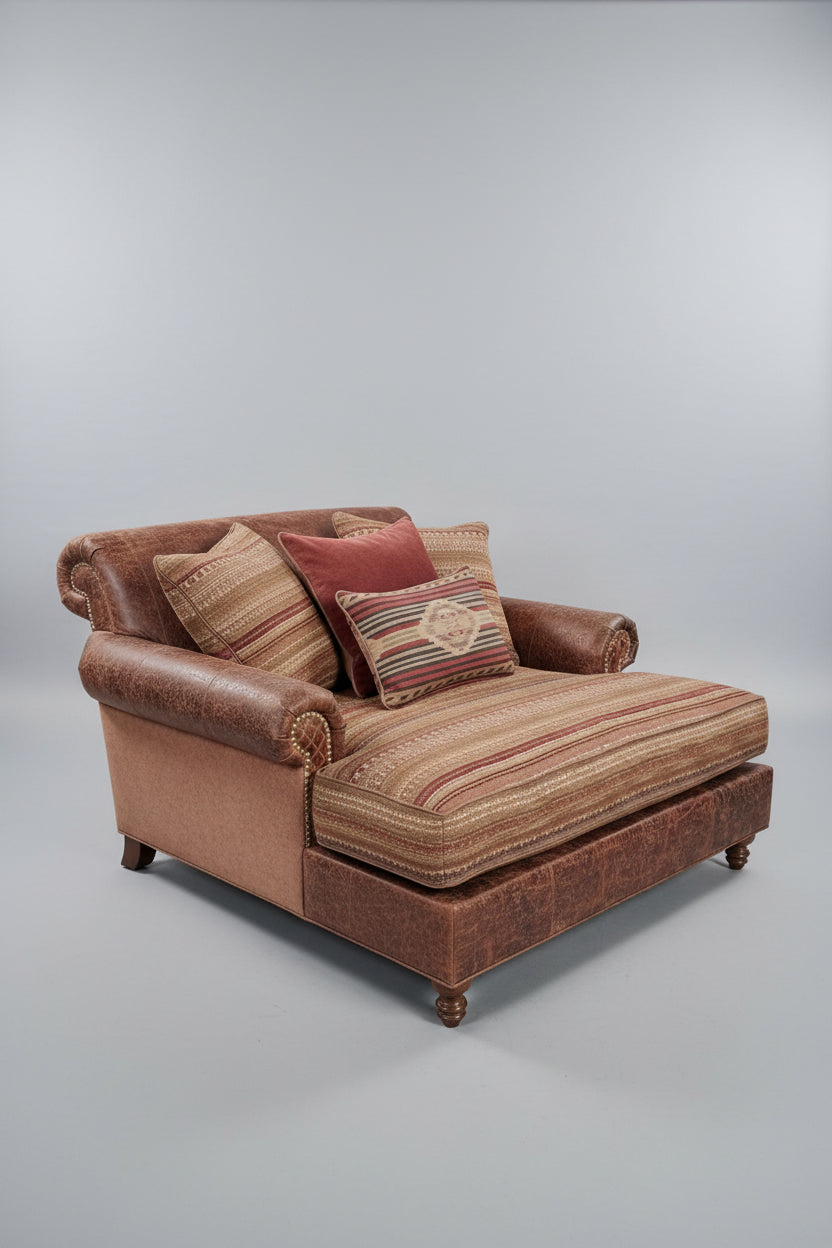 Brown sofa with striped cushions on a gray background