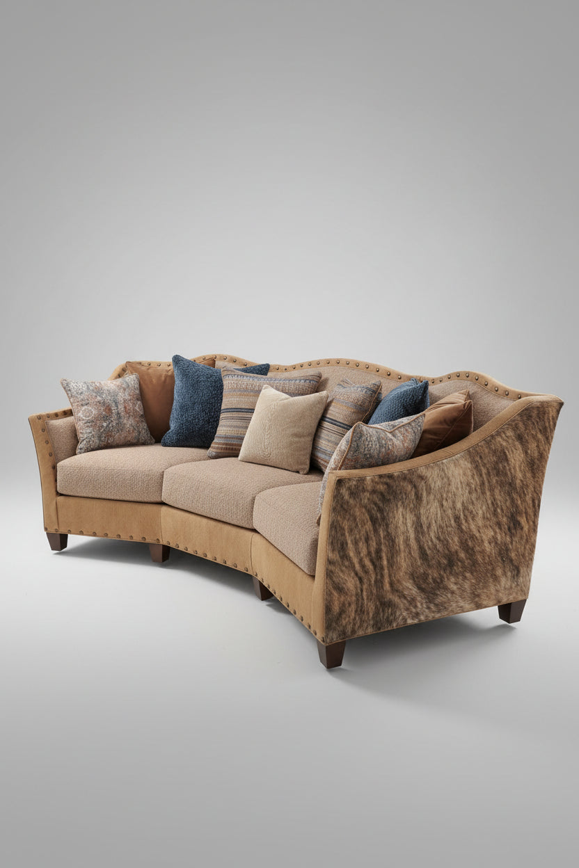 Two-toned sofa with patterned cushions on a gray background