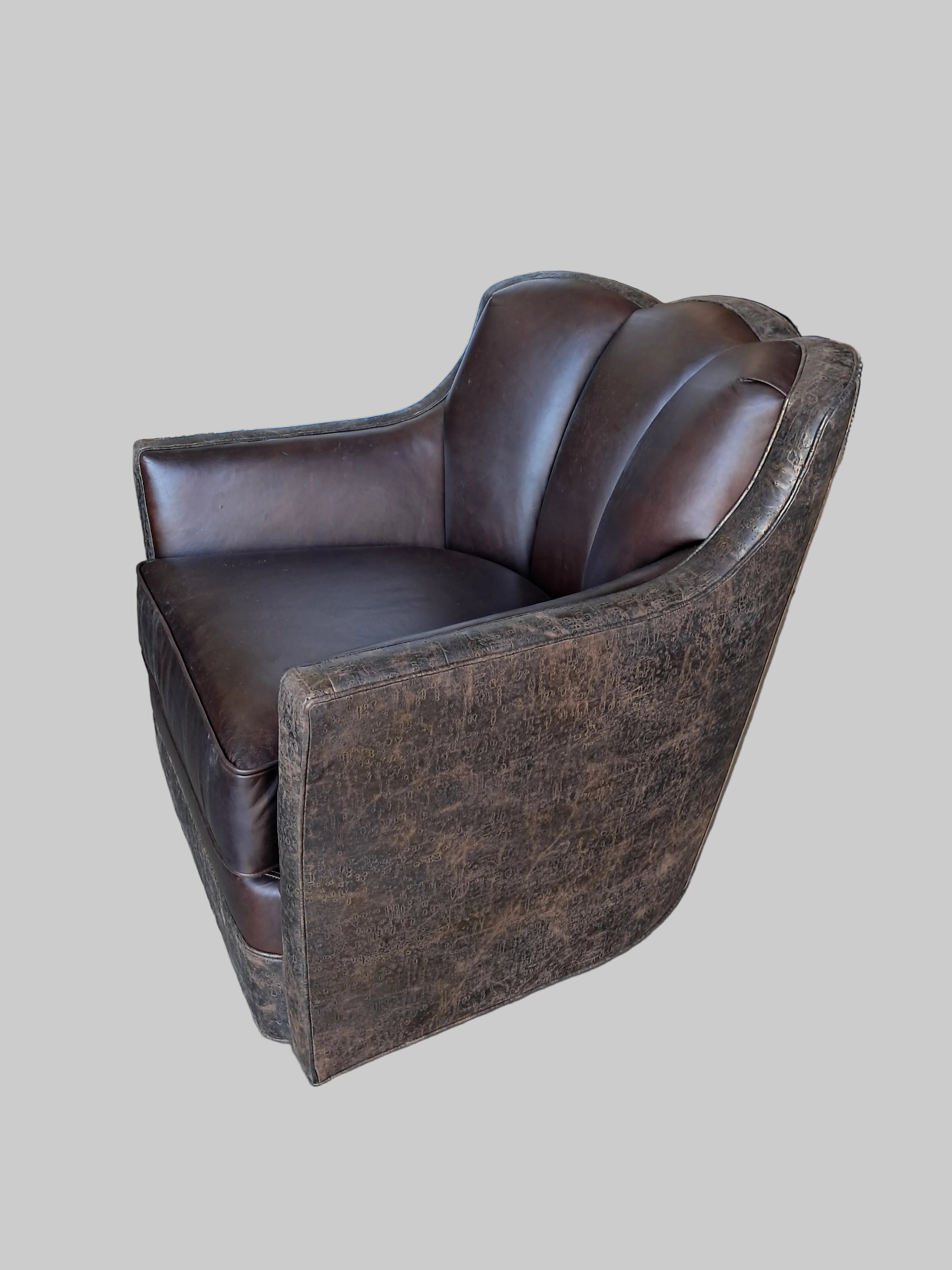 Brown leather armchair on a gray background