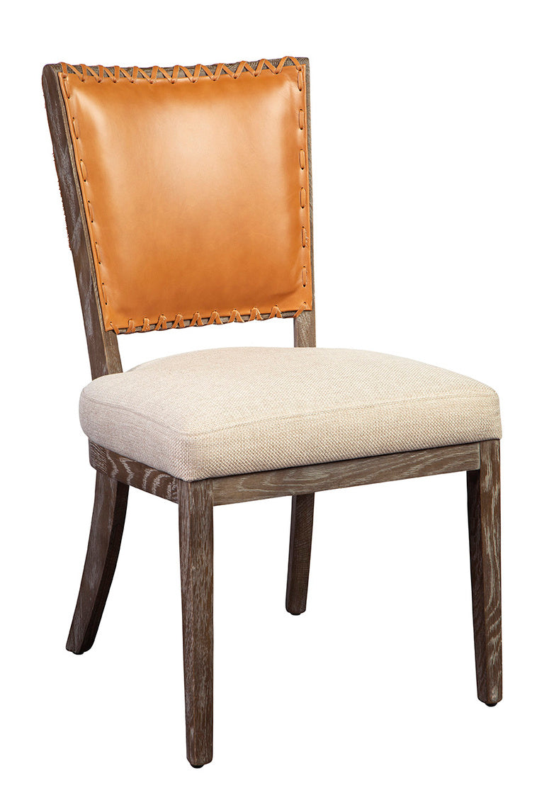 Chair with brown leather backrest and beige cushion on a white background