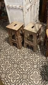 Pair of neo-Gothic carved oak stools with pierced sides in pale oak