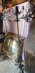 Triple wrought iron Gothic candelabra with scrolling arms, tall and boldly drawn