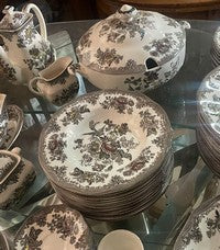 Brown transferware dinner service with a lidded tureen and floral printing in sepia