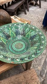 Moroccan platter in deep emerald green glaze incised with radiating leaf forms