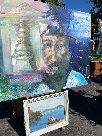 Large portrait painting of Nostradamus bearded and hatted against an architectural ground