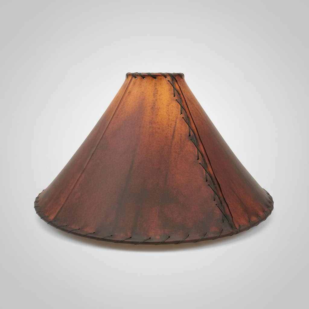 A conical leather lampshade in a warm brown color with dark brown stitched detailing along the seams, shown against a light gray gradient background.
