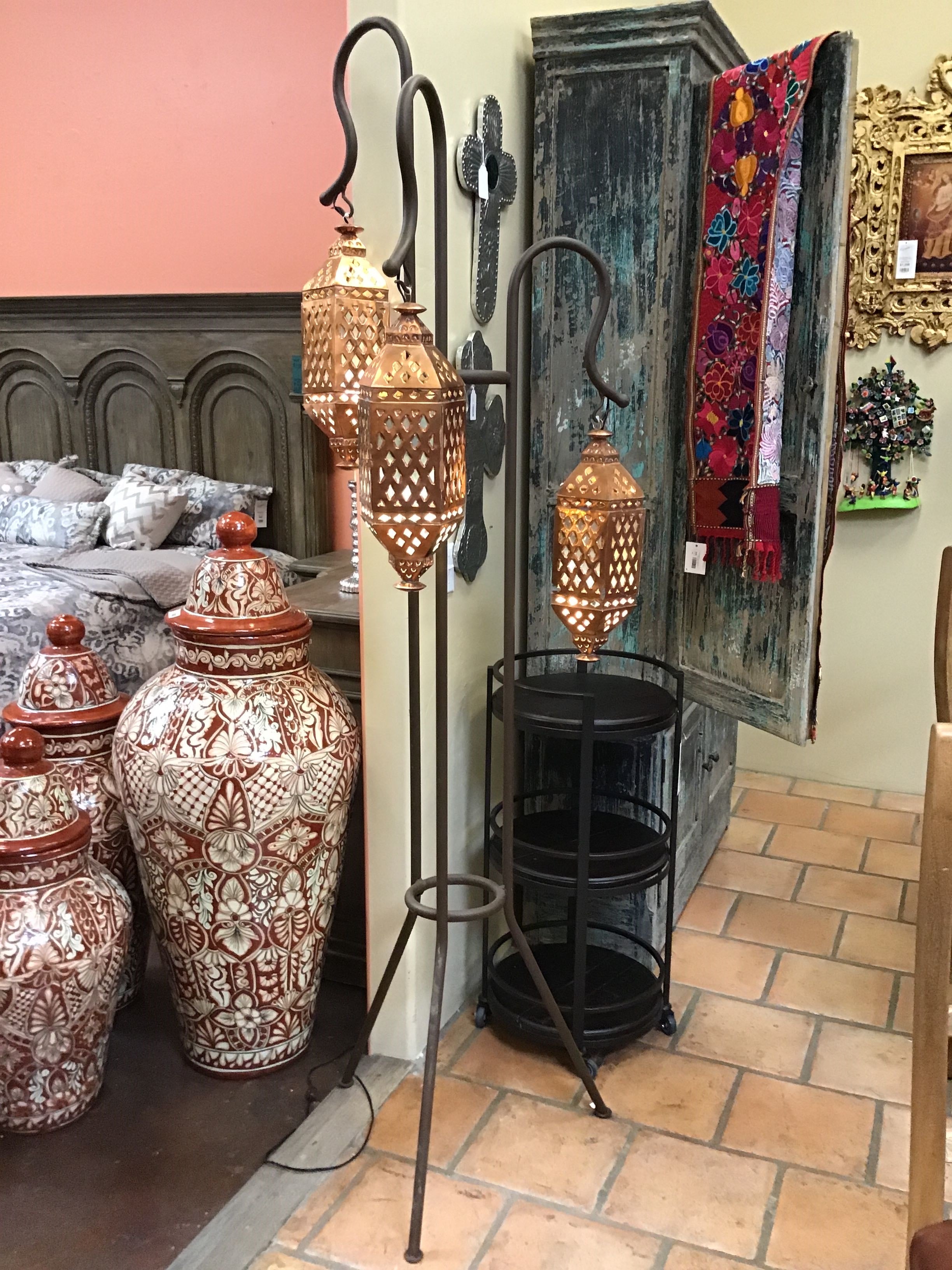 Decorative lamps and vases in a room with a rustic ambiance