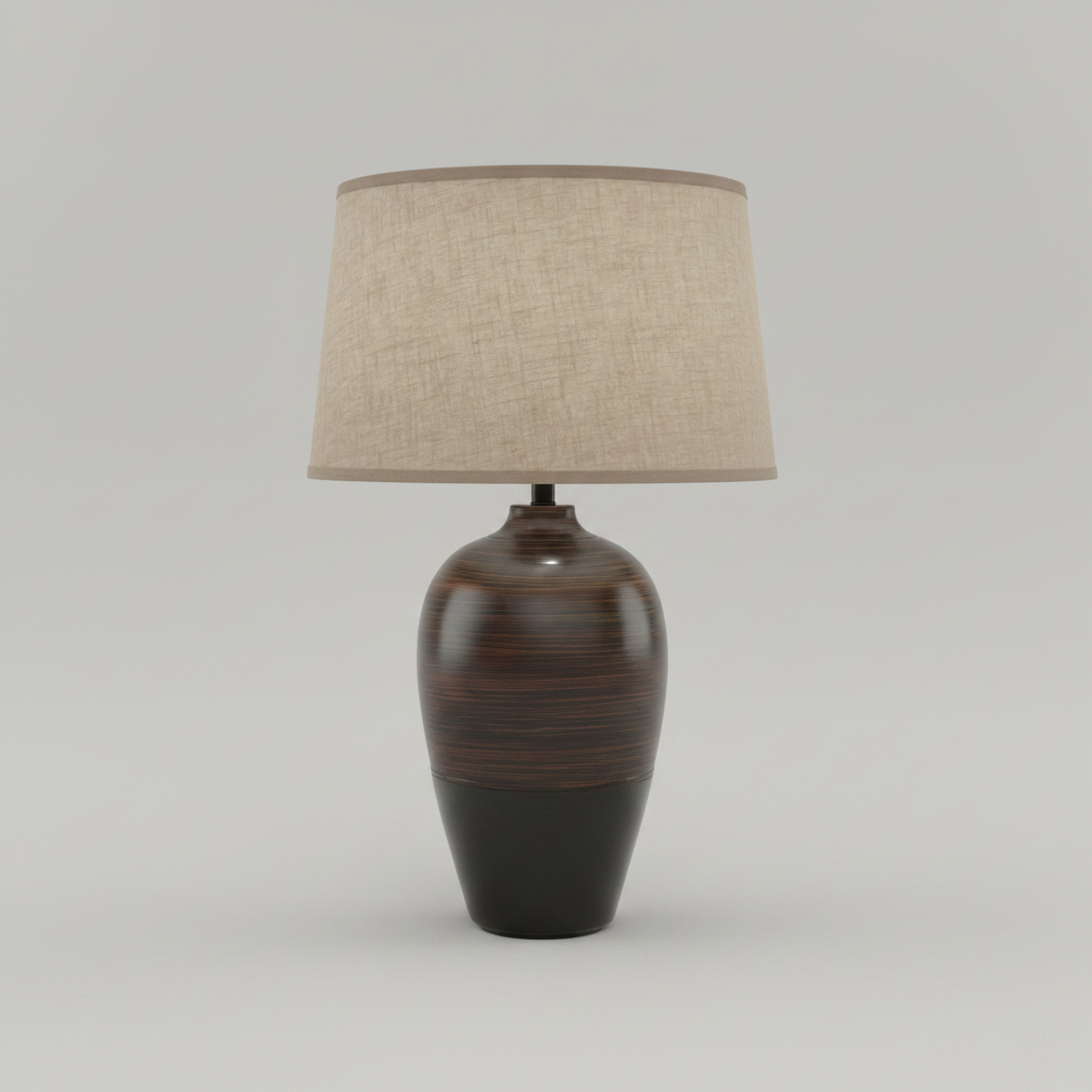 Table lamp with a brown base and beige shade on a gray background