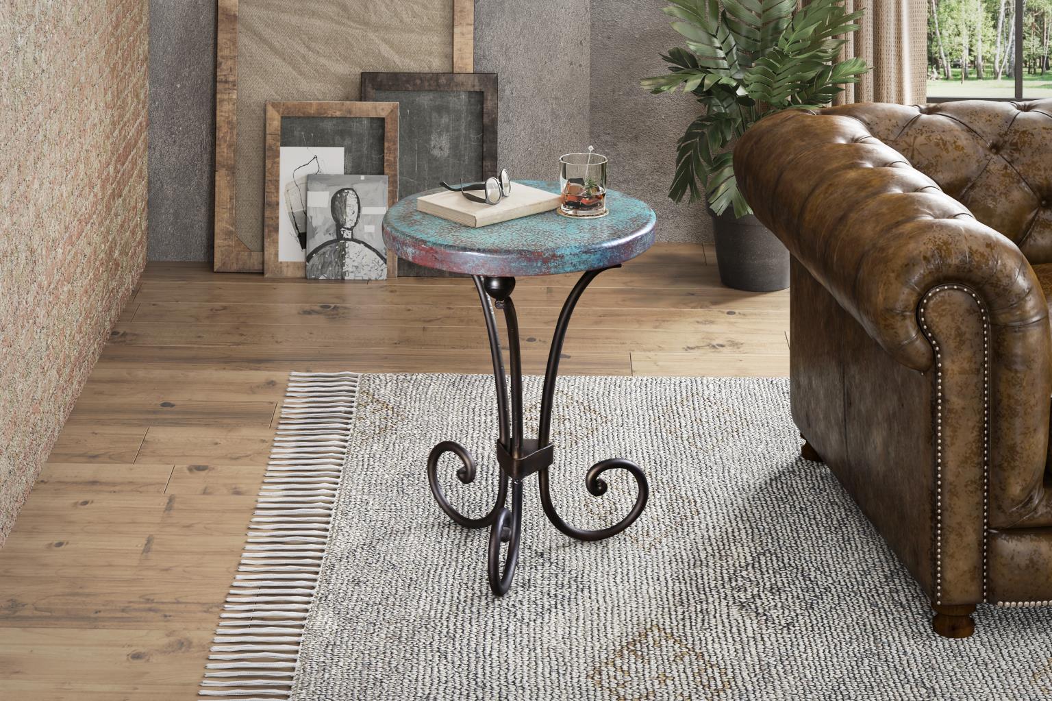 Round side table with decorative elements in a living room setting