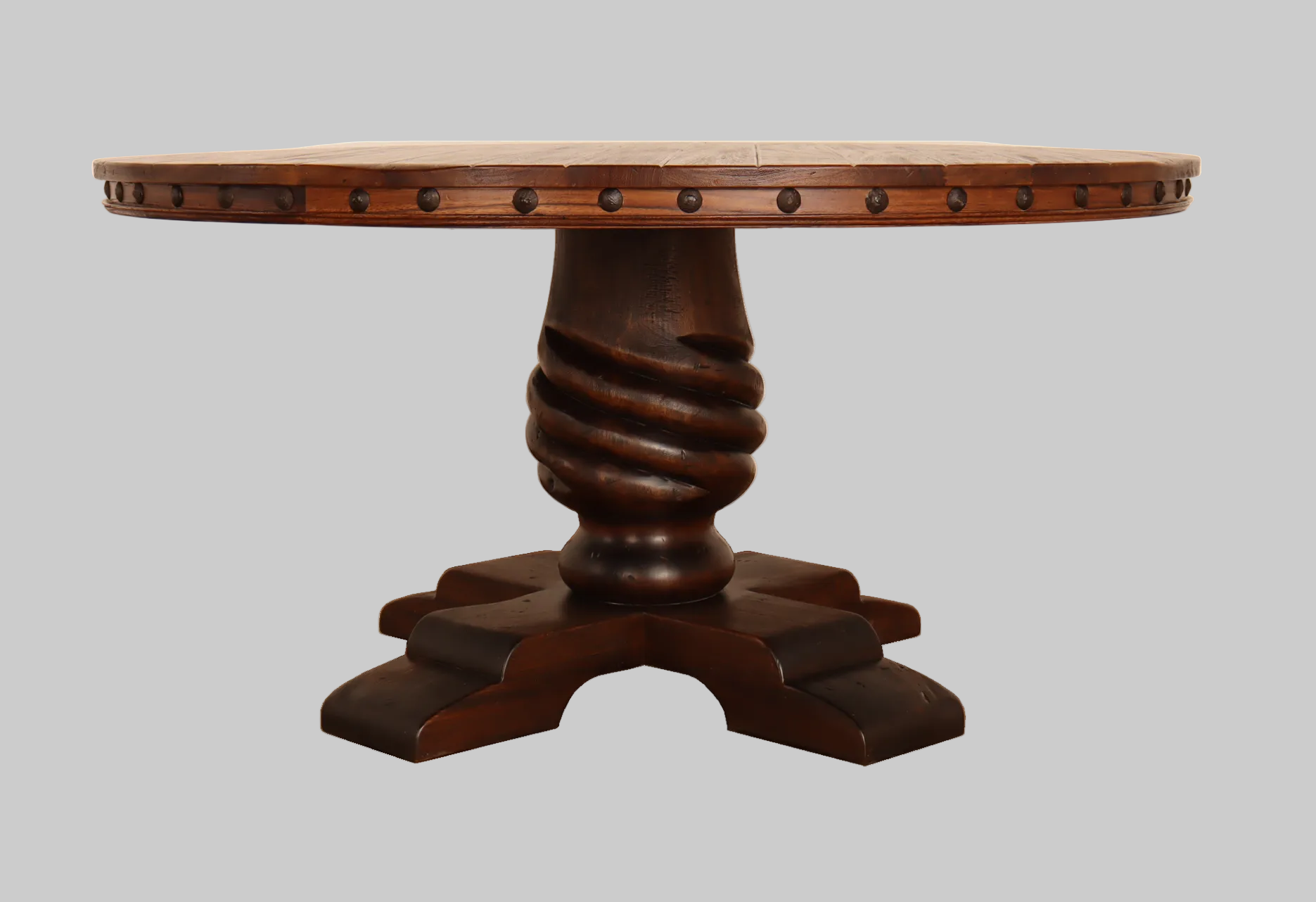 Wooden table with a twisted pedestal base on a white background