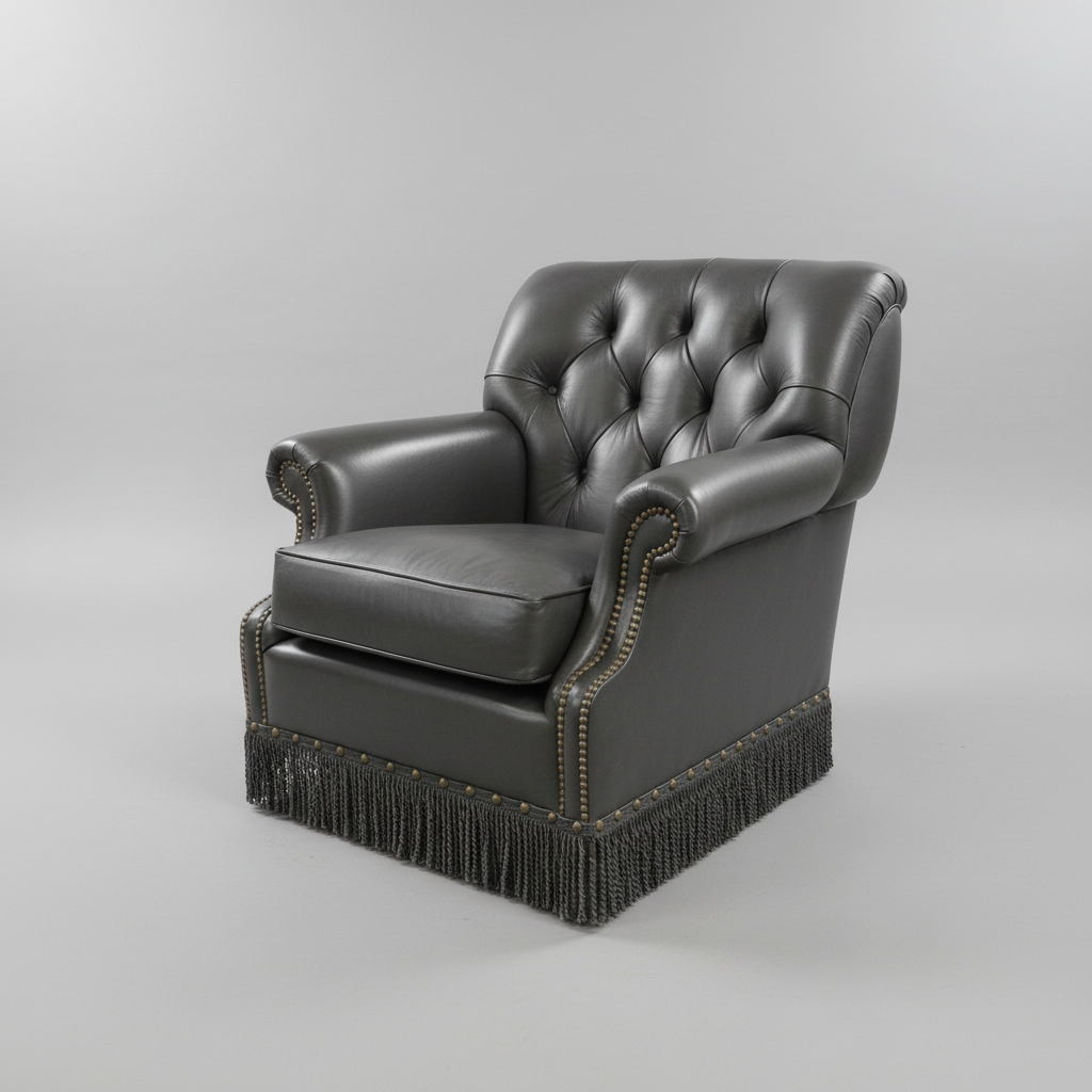 steel blue leather armchair with fringes on a gray background