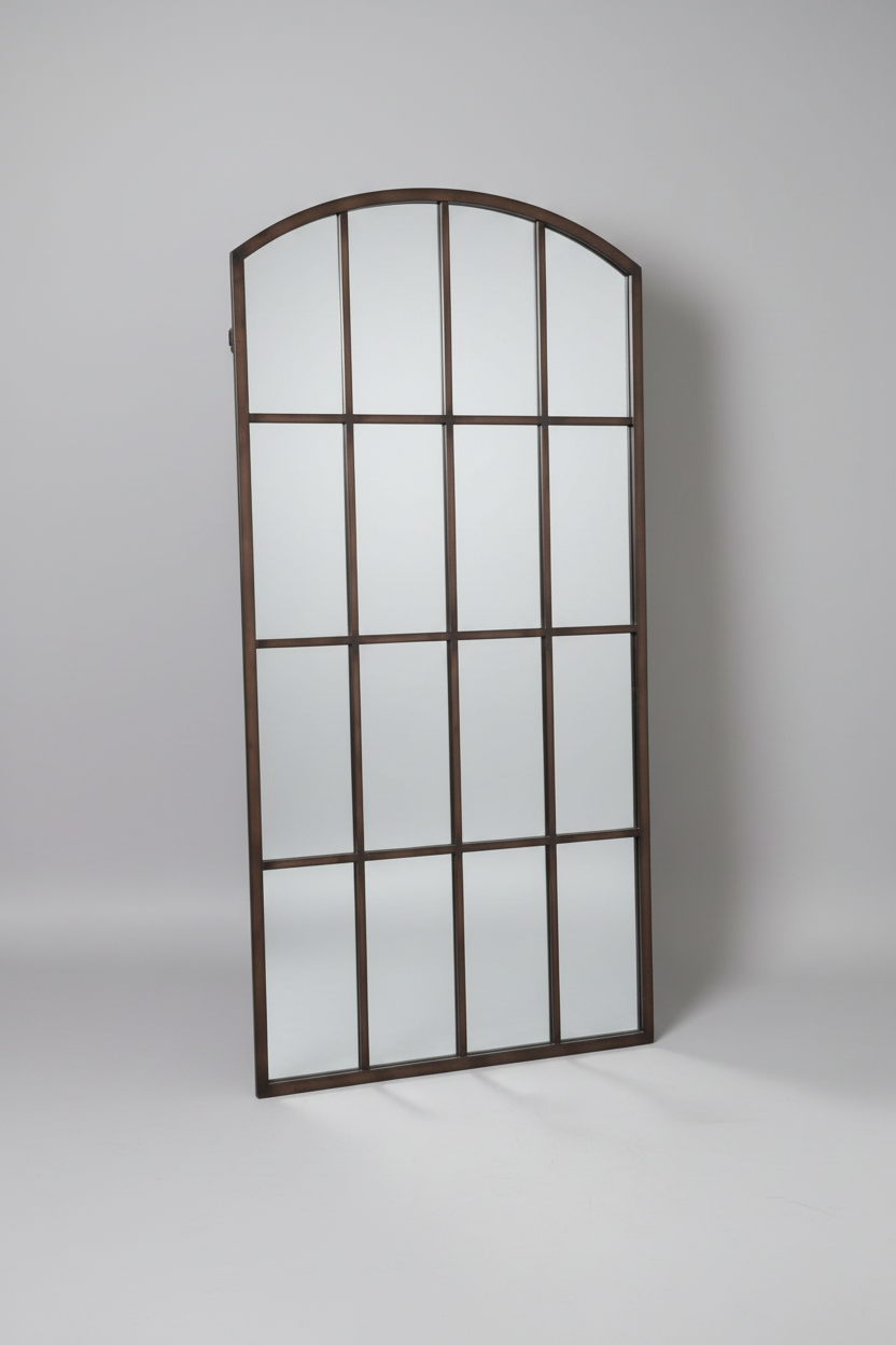 Large decorative mirror with metal frame in a store setting