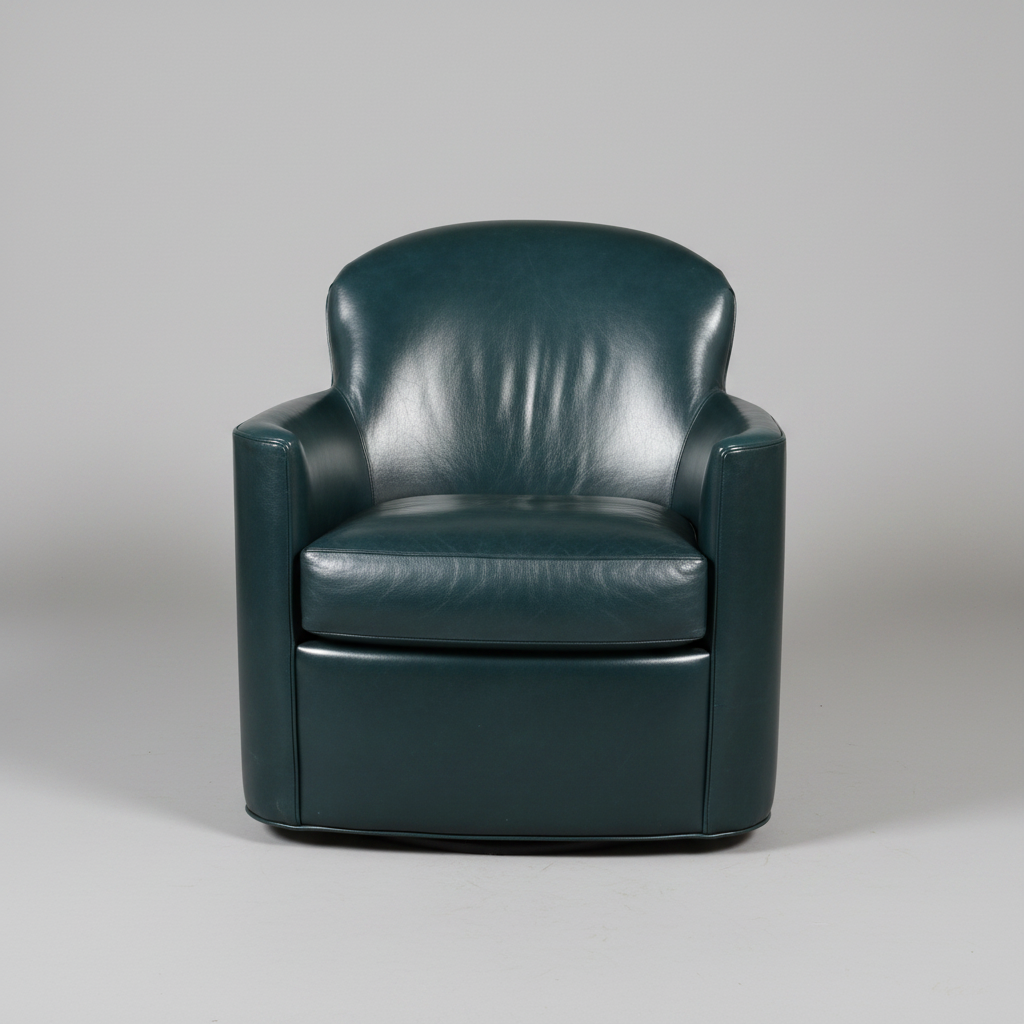 Blue leather armchair on a tiled floor with a blurred background