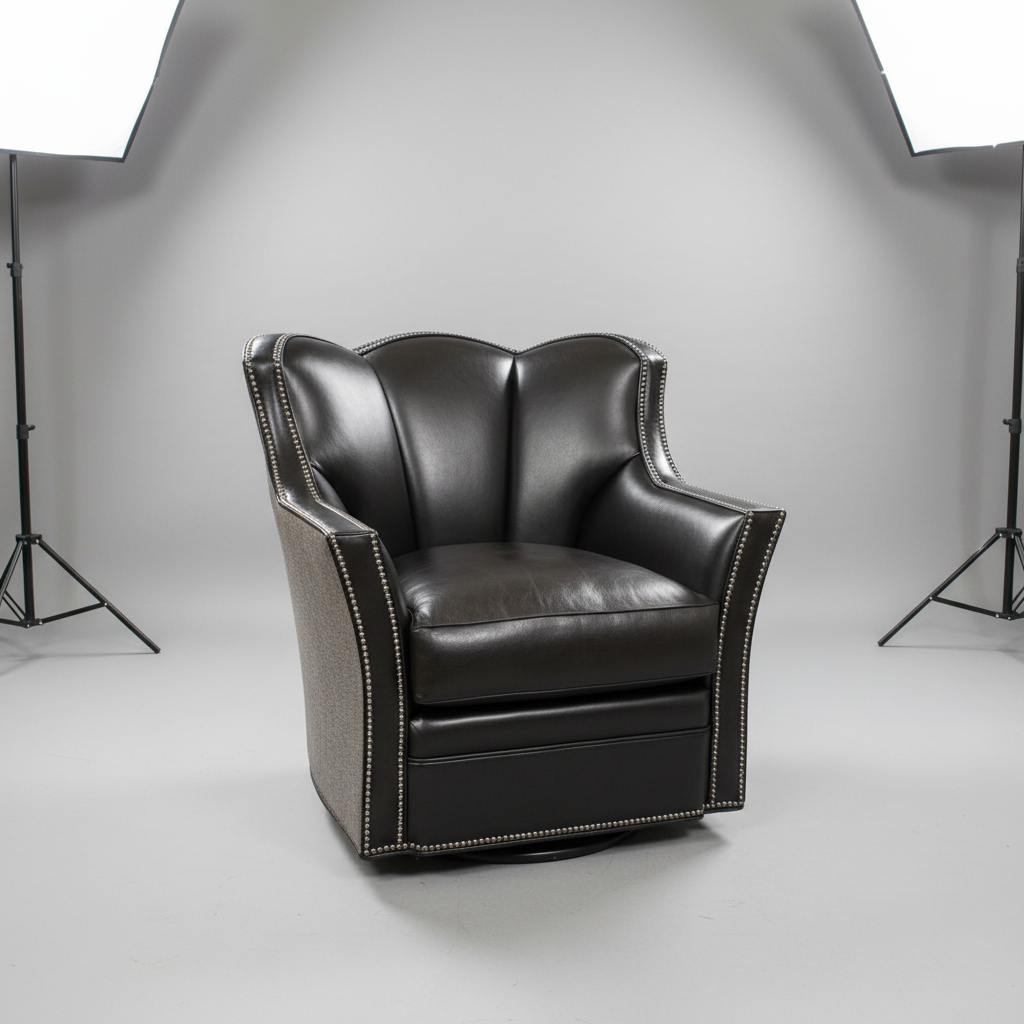 Black leather armchair in a studio setting with lighting equipment.