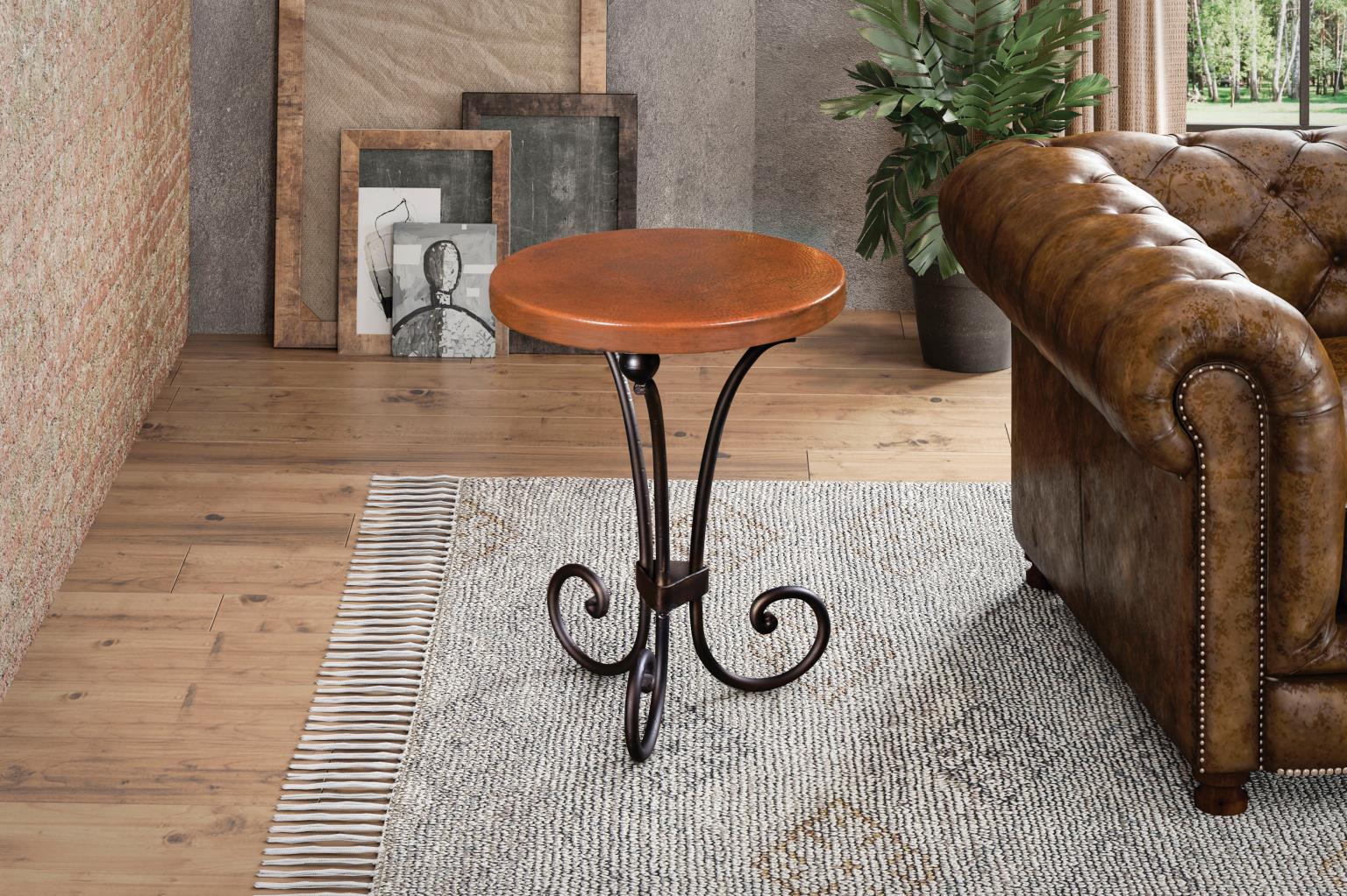 Round copper end table in a living room