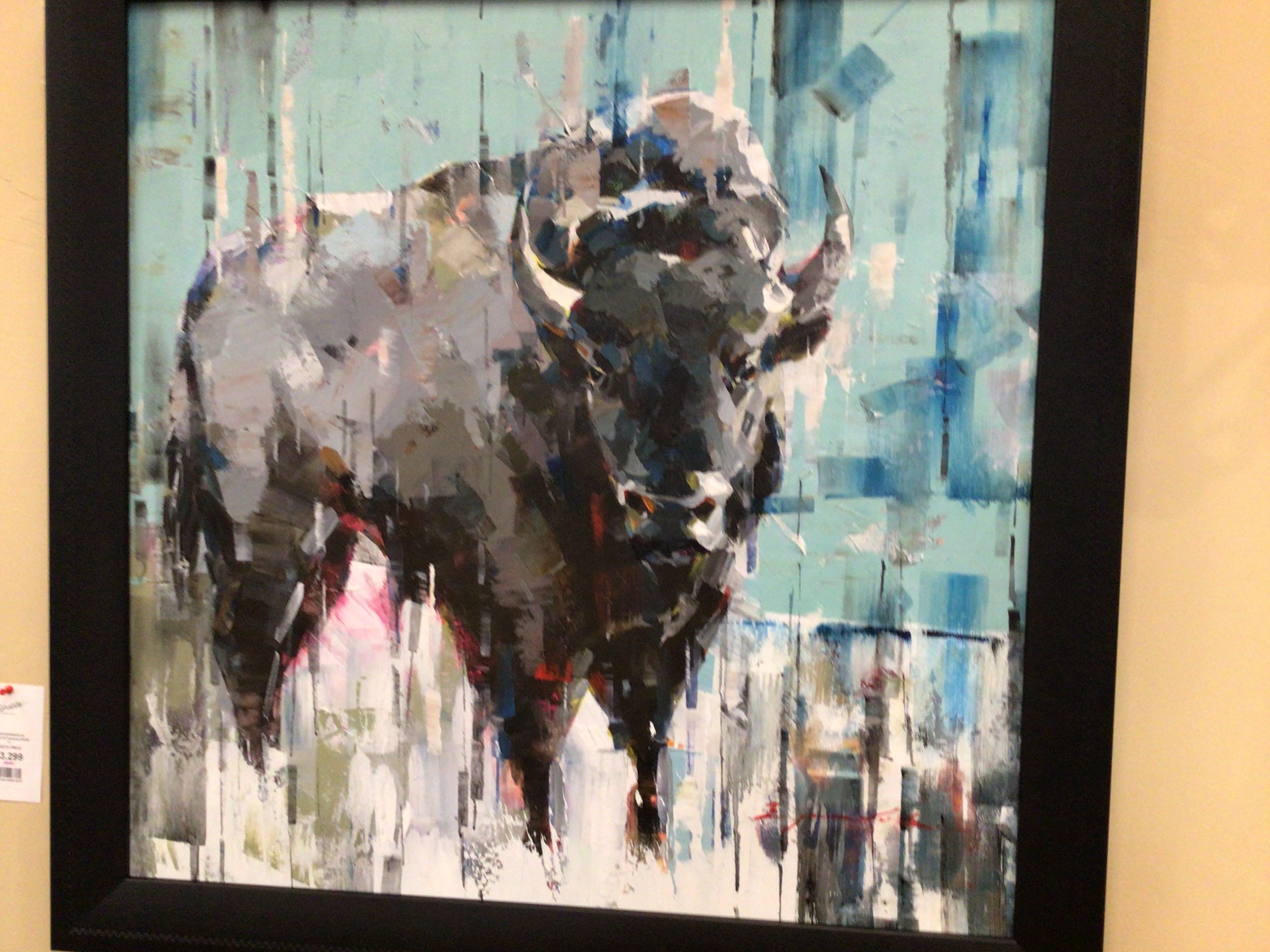 Abstract painting of a rhinoceros with a colorful background