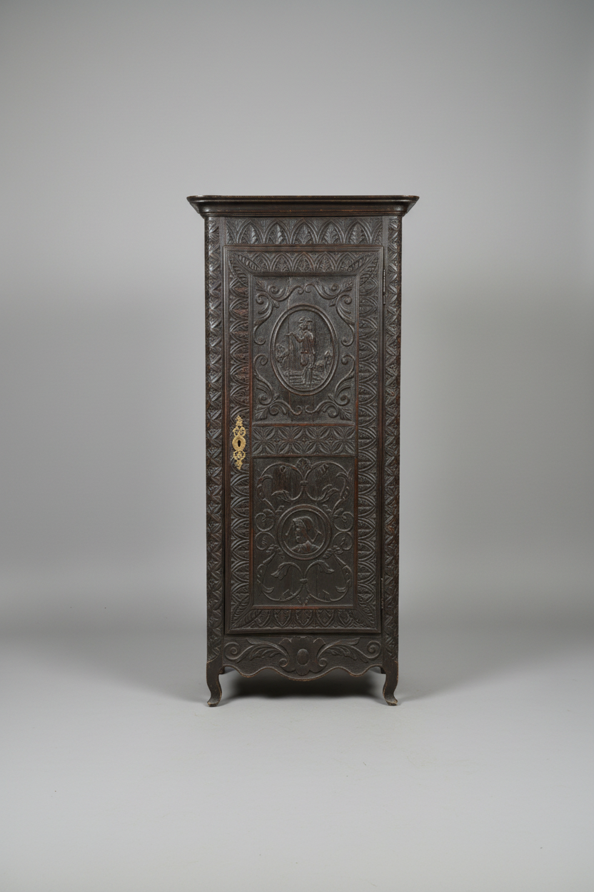 Decorative wooden cabinet with intricate carvings on a gray background