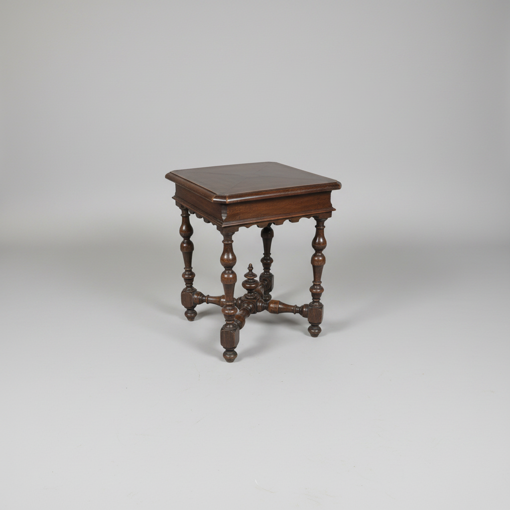 Wooden side table with intricate legs on a gray background