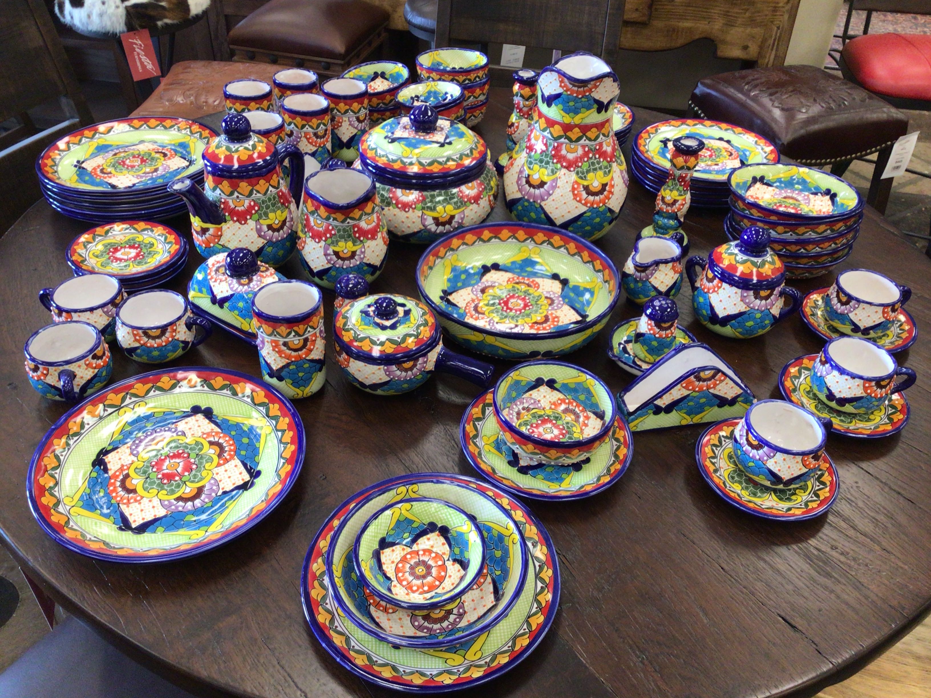 Colorful ceramic tableware set on a wooden table