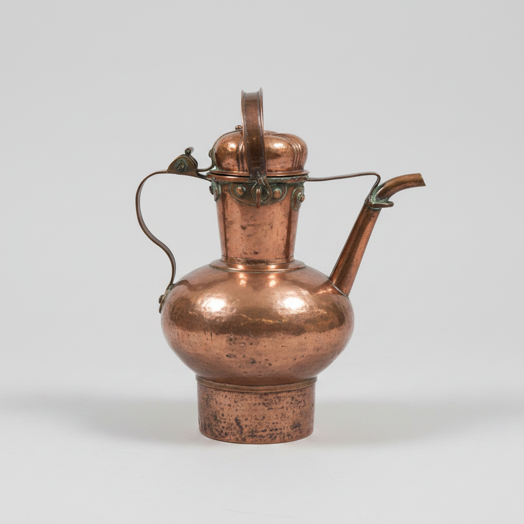 An antique copper teapot with a rounded body, lid, and curved spout, photographed on a neutral light gray background.