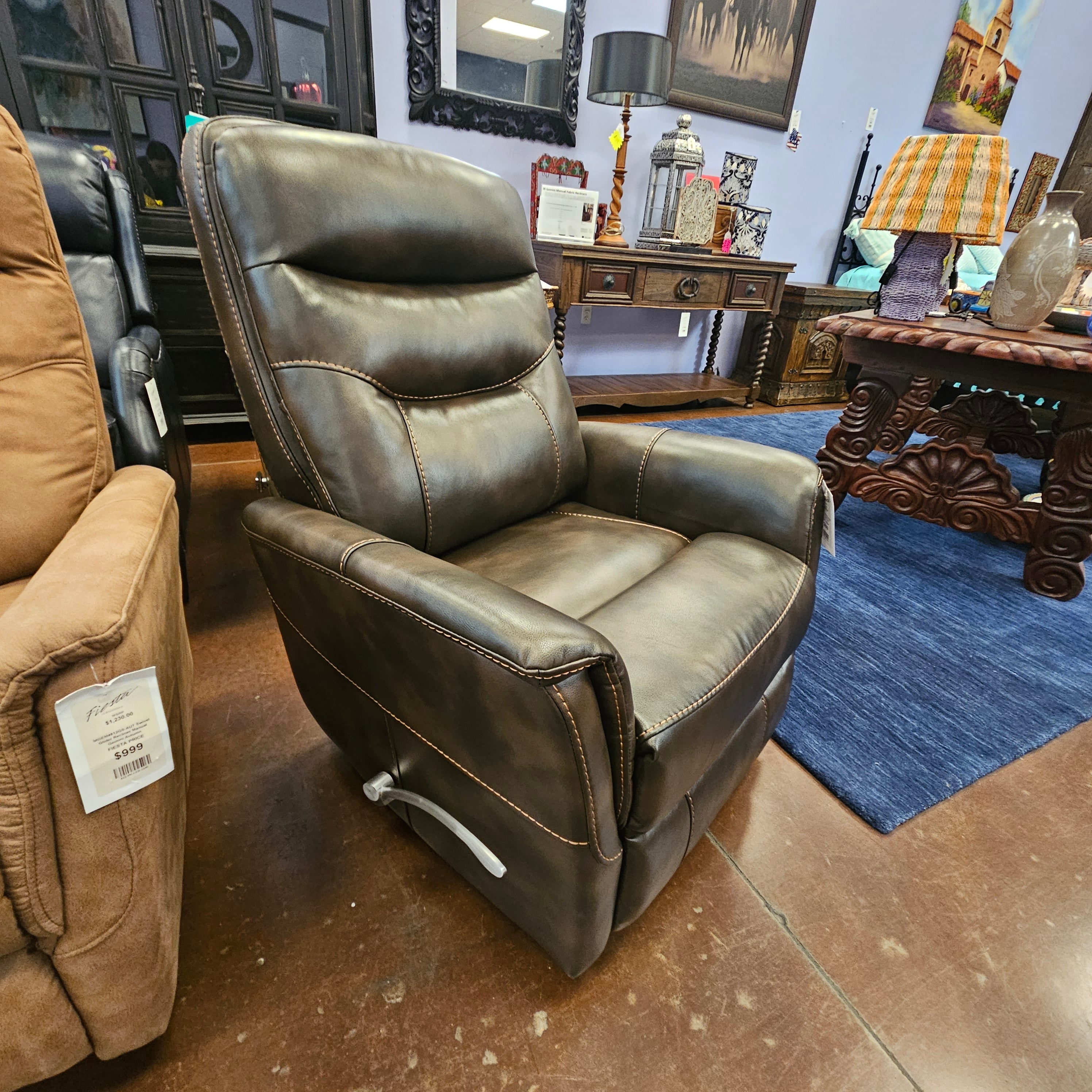 Brown leather recliner chairs in a room with decorative elements.
