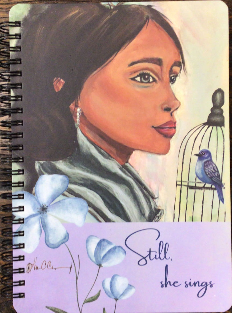 Notebook Still. She Sings