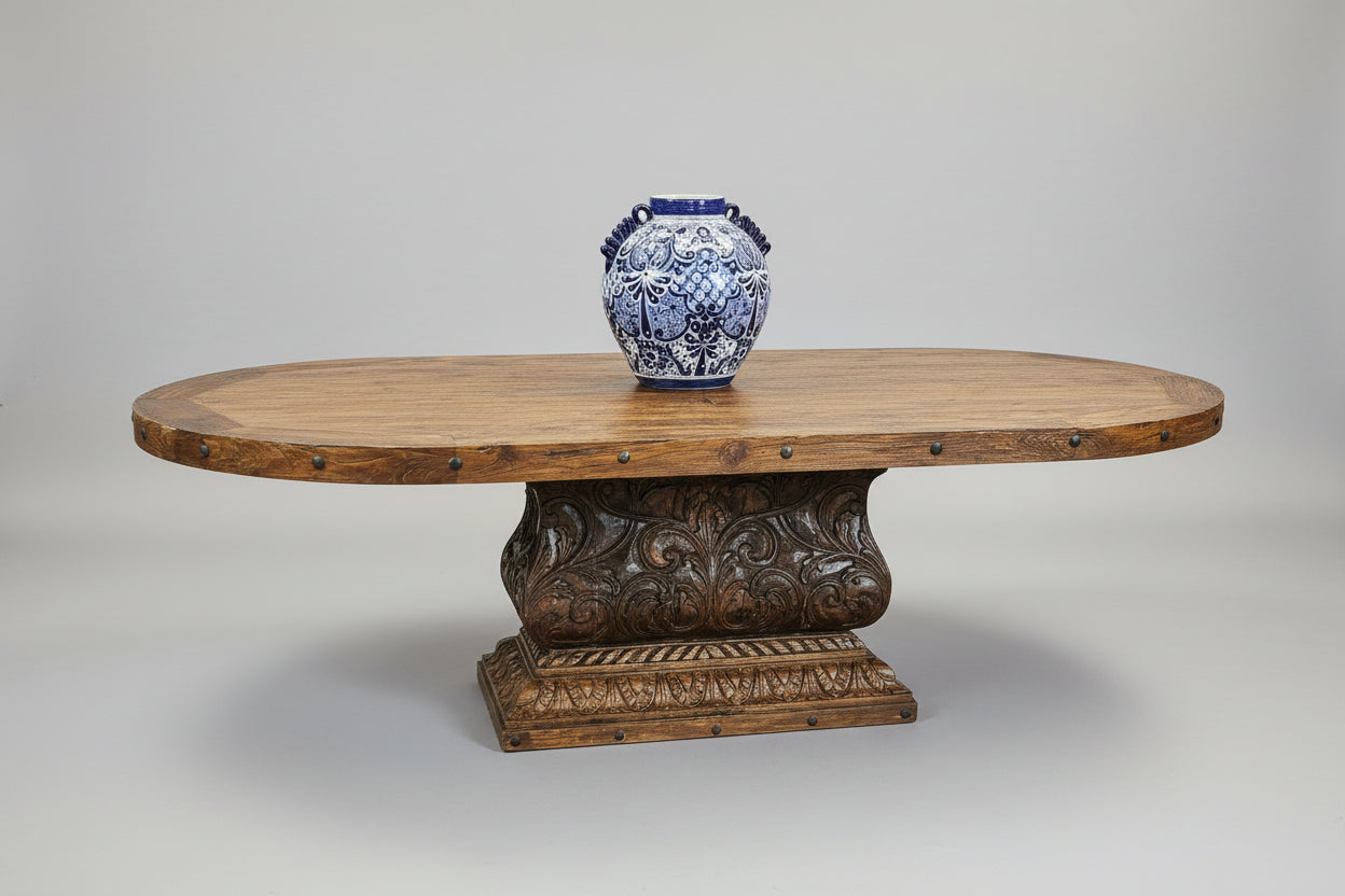 Wooden table with a decorative vase on a plain background