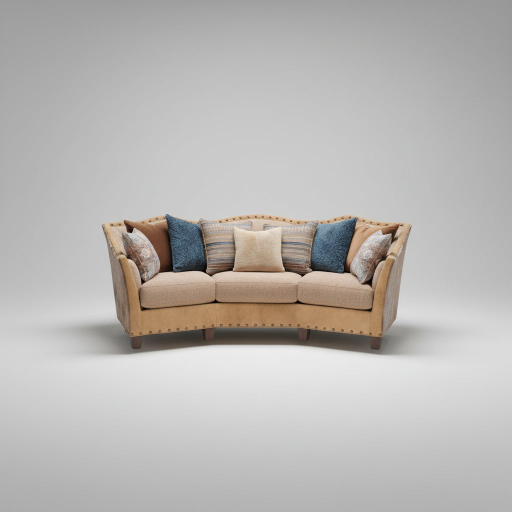 Beige sectional sofa with patterned cushions on a gray background
