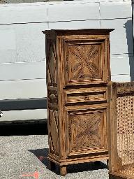 Louis XIII bonnetiere cabinet in blond oak with a diamond point carved door