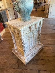 Carved sellette pedestal stand with Gothic floral ornament under a whitewashed patina