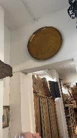 Moroccan engraved copper charger plate with concentric bands of geometric ornament