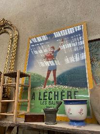 1930s French travel poster for La Lechere-les-Bains showing a skier in red against blue stripes