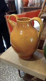 Ochre glazed two-handled water jar with bold loop handles rising from shoulder to neck