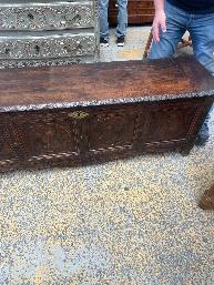 Carved oak wedding trunk with rope twist moldings and panels of kissing birds