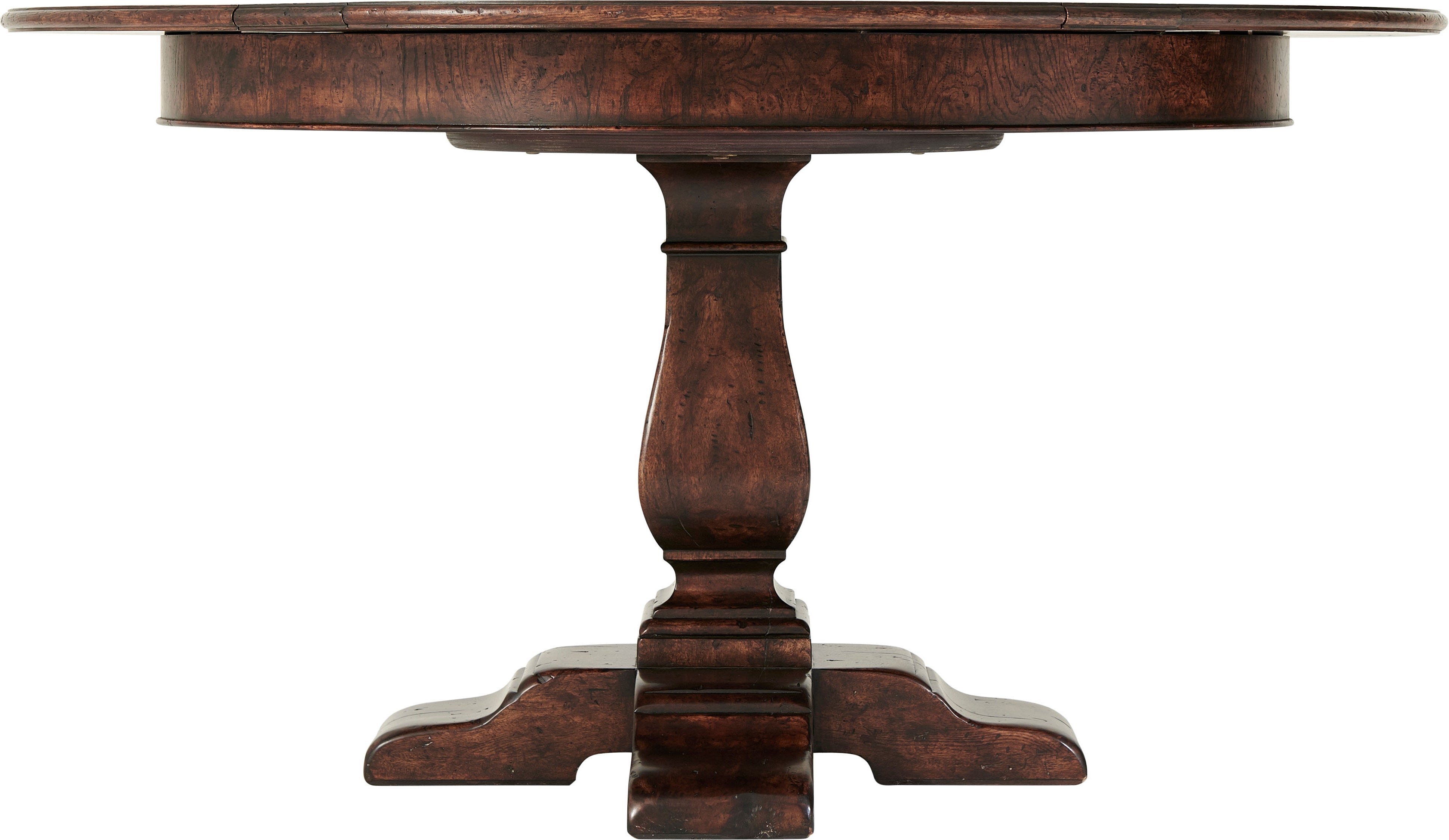 Side view of the Victory Oak Jupe dining table showing crossover refectory feet and plain frieze