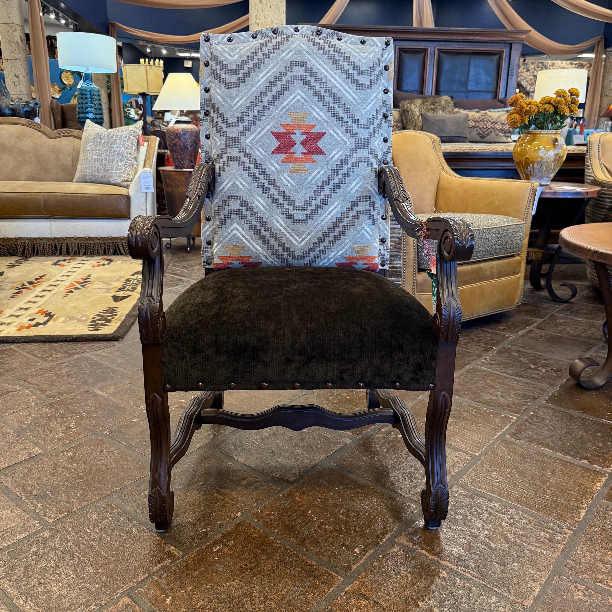 Chair with patterned backrest in a showroom setting