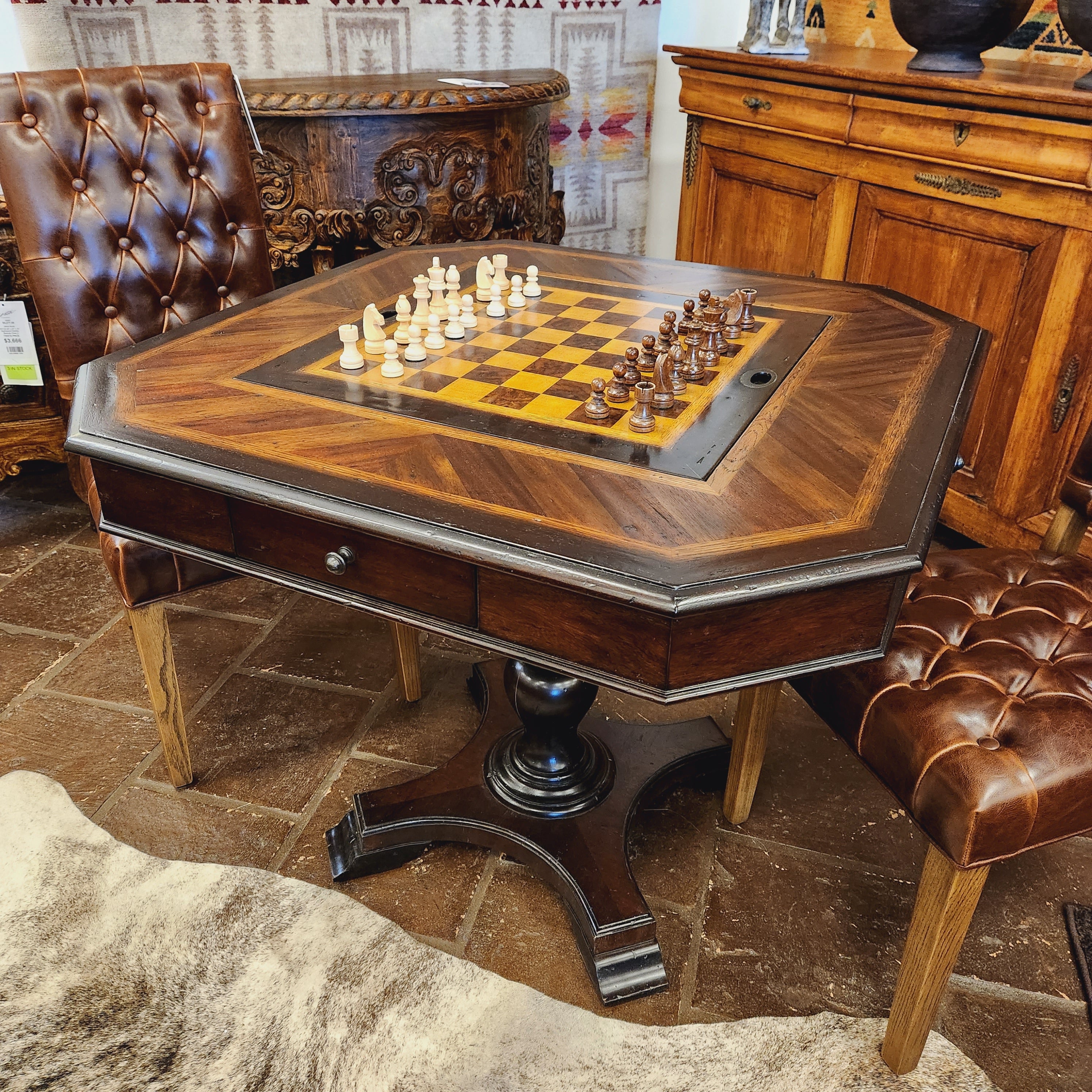 Wooden chessboard with pieces on a stone floor